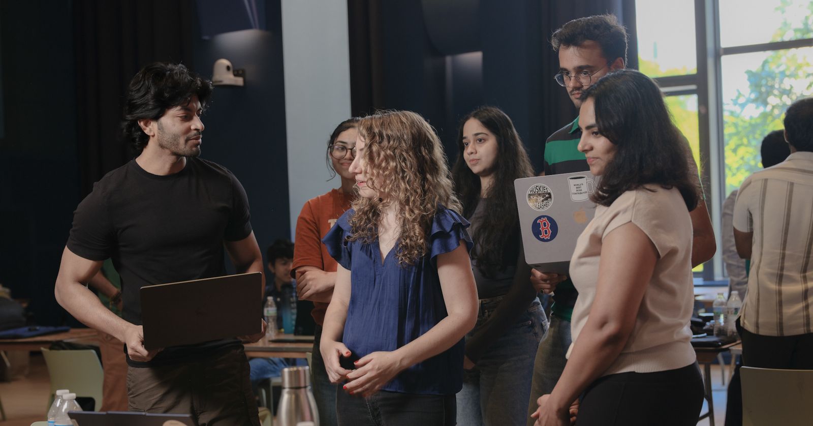 The team walking a judge through Altair during the hackathon